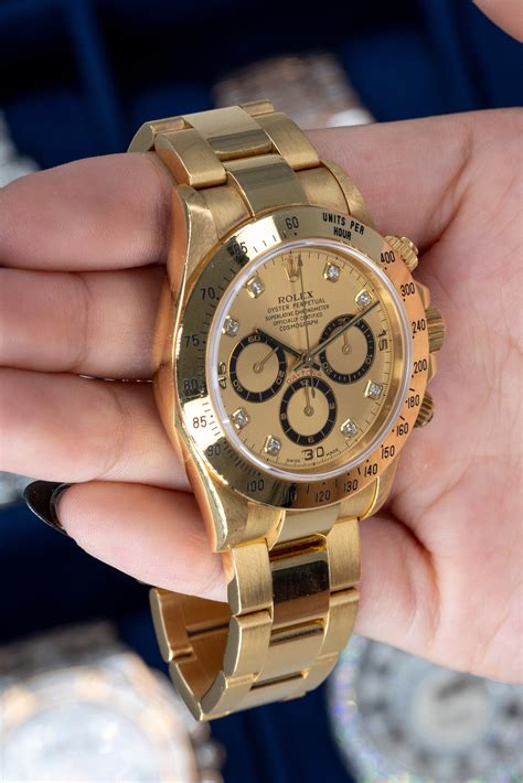 yellow gold rolex daytona